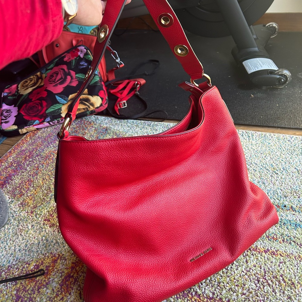 Michael Kors large red leather tassel handbag